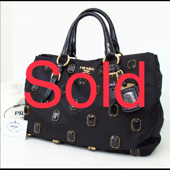 Prada Handbags - Sold Prada XL jewelry bag authenticated
